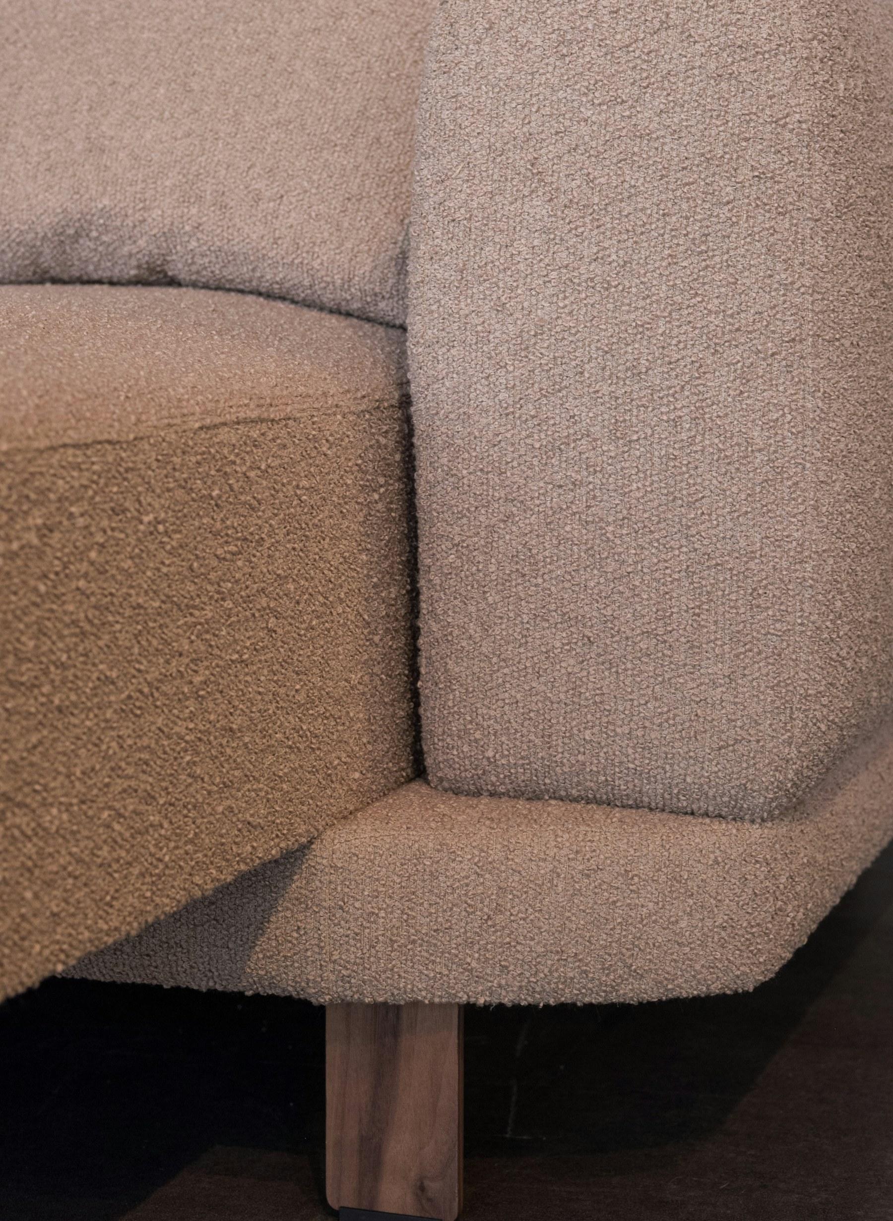 Detail krémového boucle poťahu